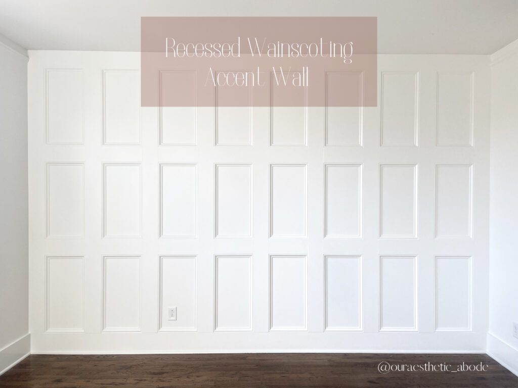 A Recessed Wainscoting Accent wall painted in a warm white. It's a box moulding with 24 boxes (3 rows of 8) created by MDF boards with base cap trim framing it out.