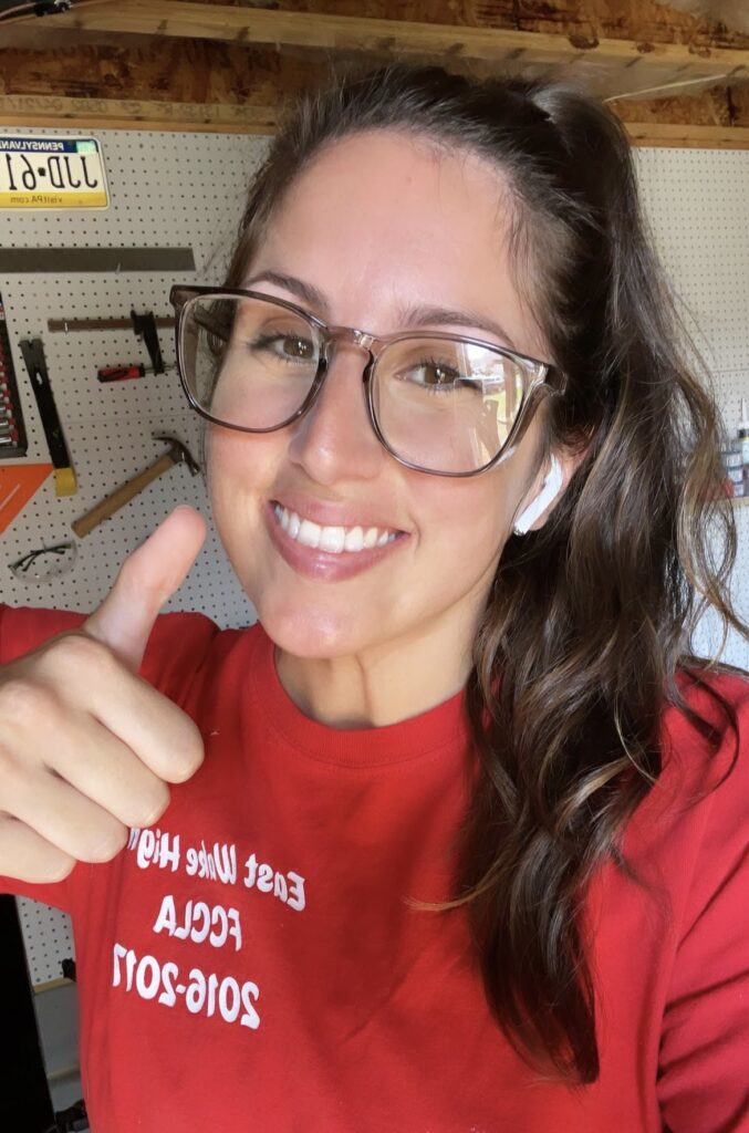 Elisha at Our Aesthetic Abode is wearing her stylish safety glasses, #1 on her beginner DIYer checklist, and has a thumbs up!