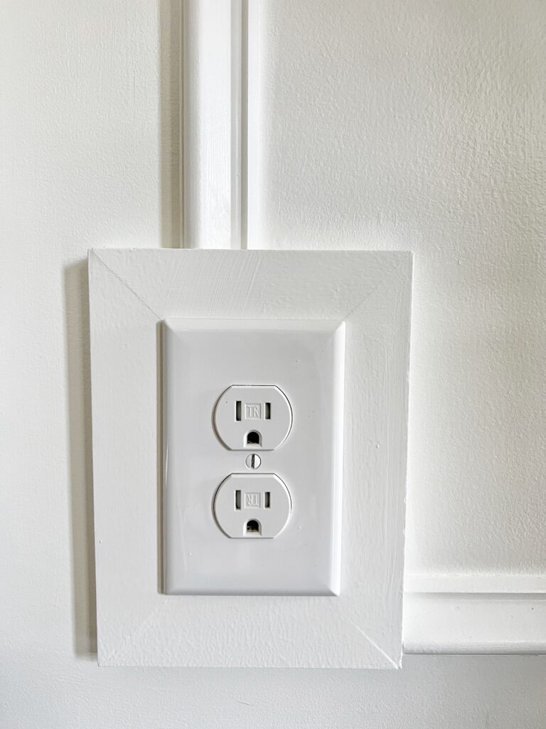 Dan from Our Aesthetic Abode made an extended outlet box for the box molding