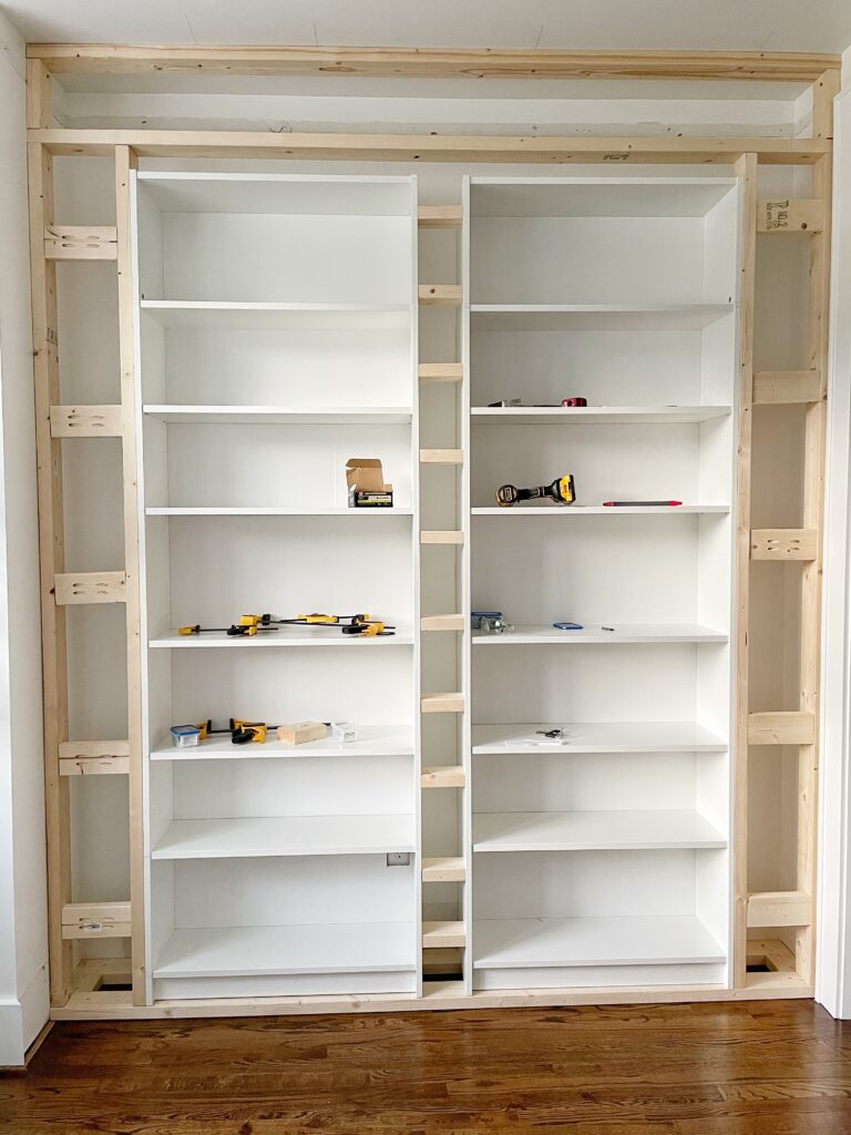 Two Ikea Billy bookcases framed into a wall using 2x4s