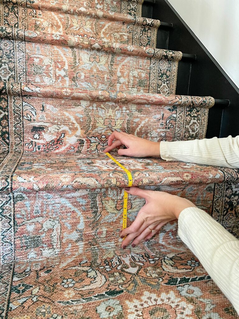 this picture shows How to Measure for a Stair Runner, flexible measuring tape is molding along the outline of one step
