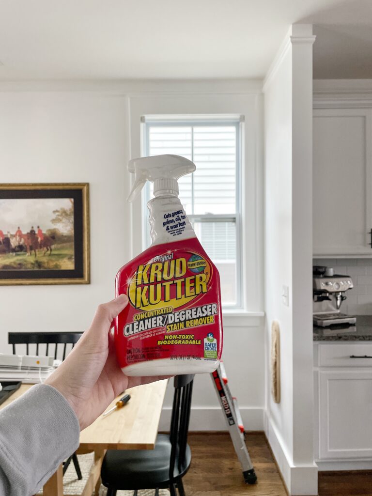 A picture of a window and krud kutter to clean in preparation for trim paint