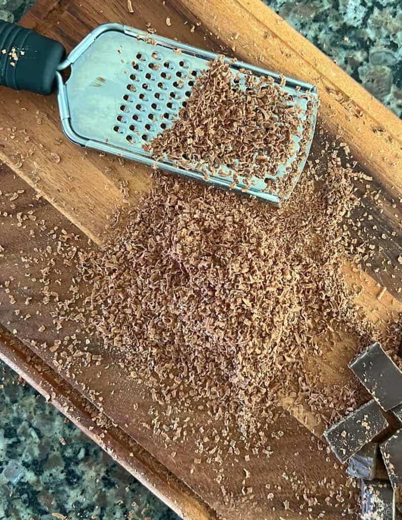 A small grater was used to make tiny ribbons of dark chocolate flecks