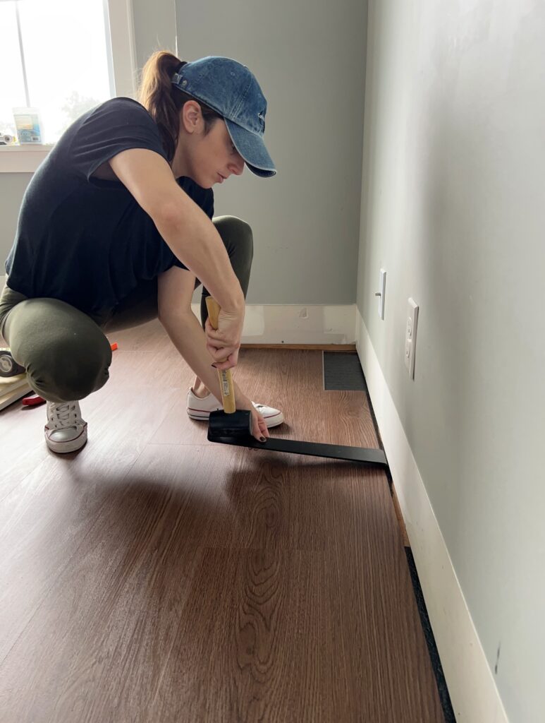Using a pull bar for the last row of vinyl plank flooring