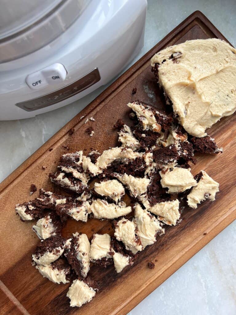 chunks of brownies with peanut butter frosting for a homemade brownie ice cream