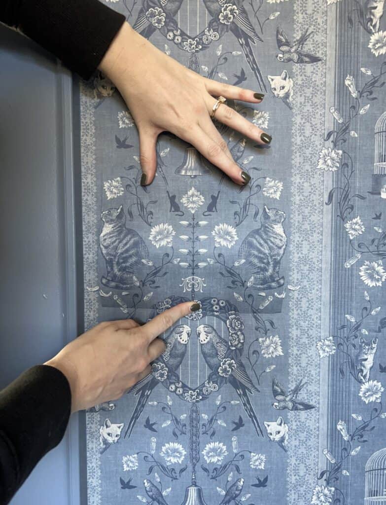 Matching the pattern for wallpapering a light switch cover