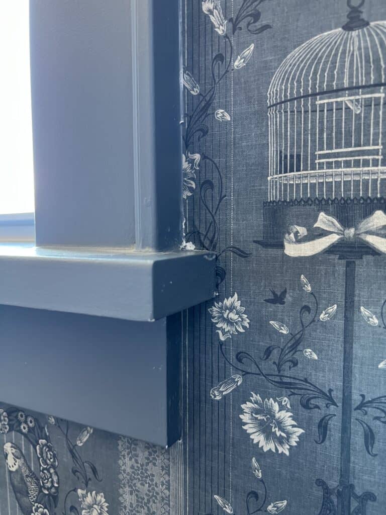 Wallpapering around a tricky window frame