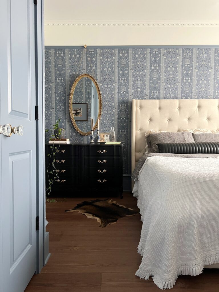 a vintage inspired bedroom with french accents