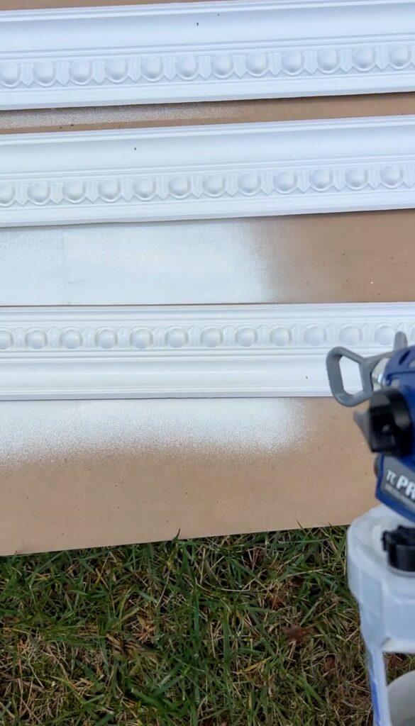 using a graco paint sprayer to paint crown moulding trim