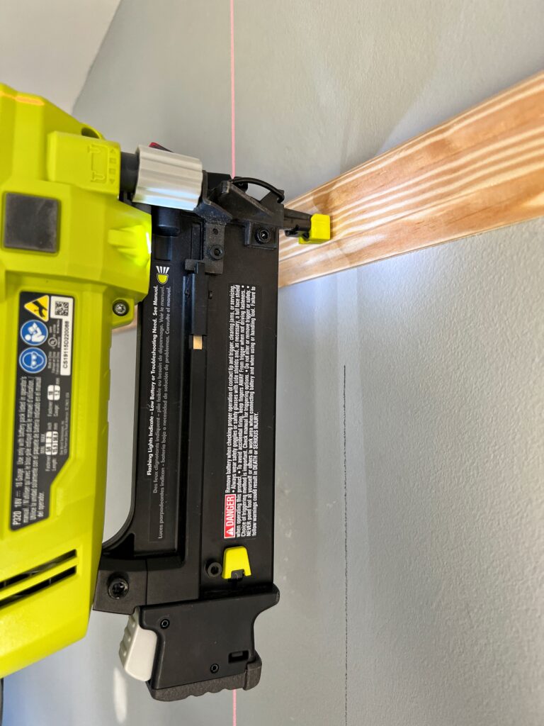 Using a brad nailer to install a picture rail hanging system