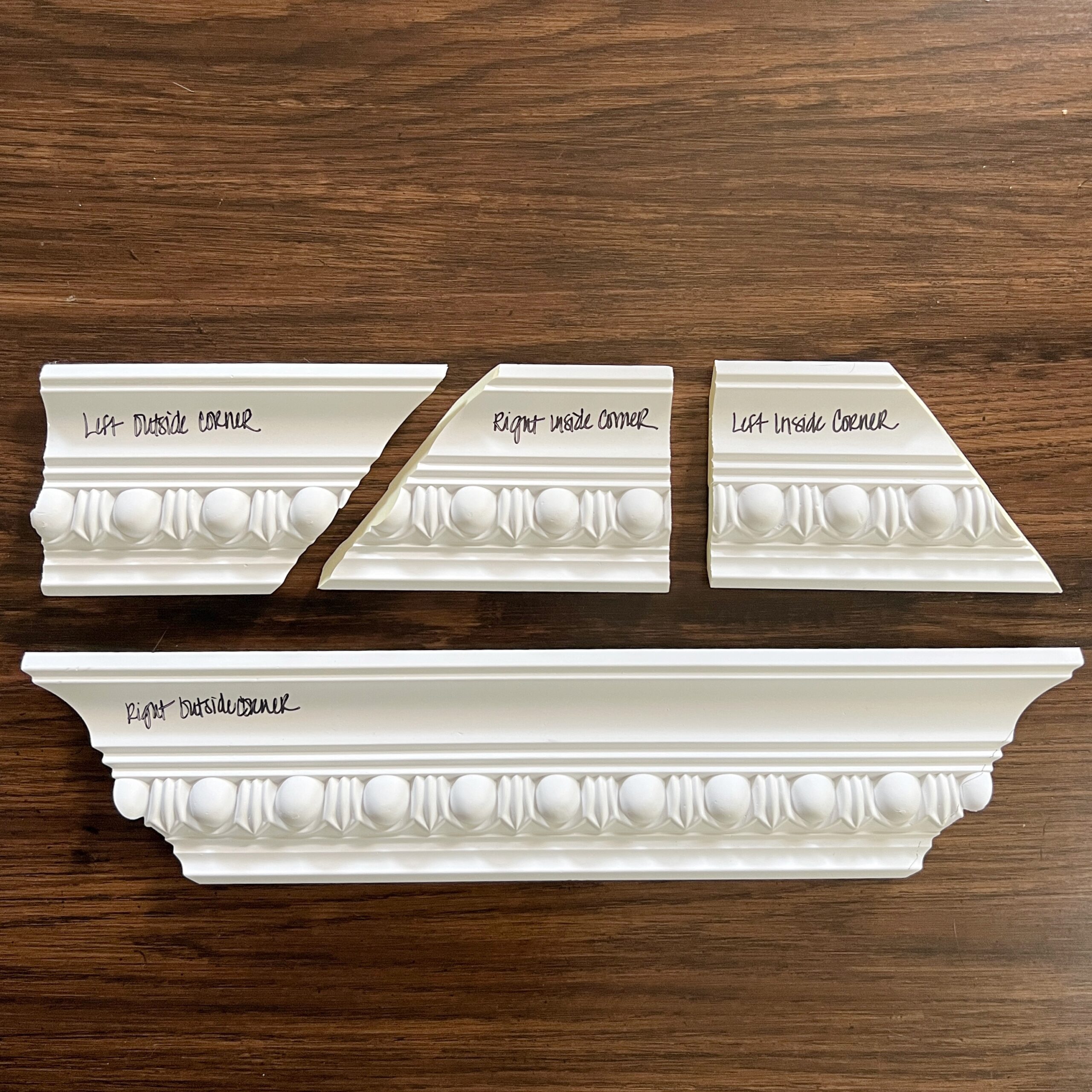 Four sample templates of crown moulding labeled left/right outside corner and left/right inside corner