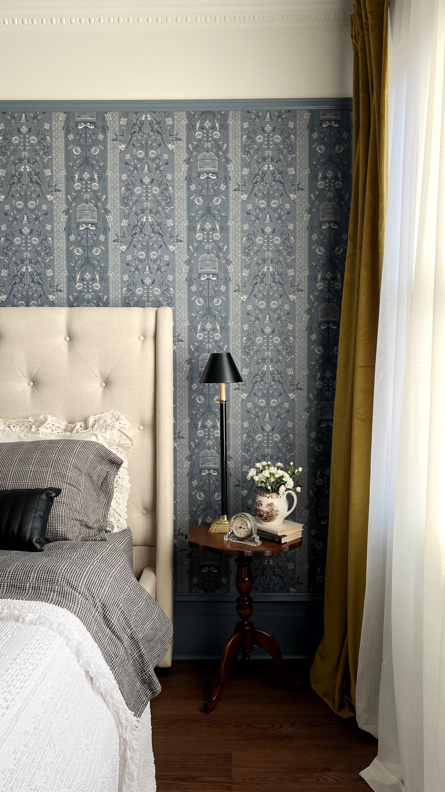 vintage wallpaper bedroom with velvet curtains and thrifted details