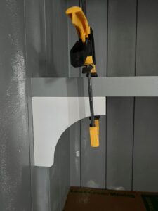 Clamping an MDF corbel to floating shelf