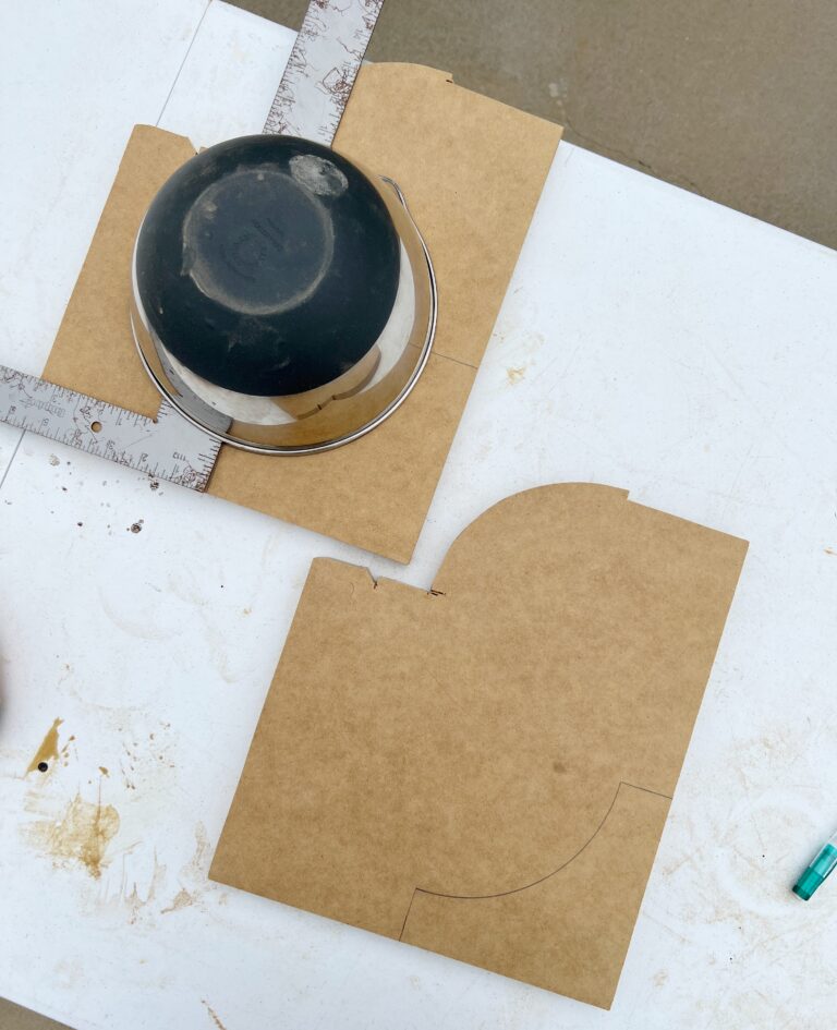 tracing a bowl to make DIY corbels