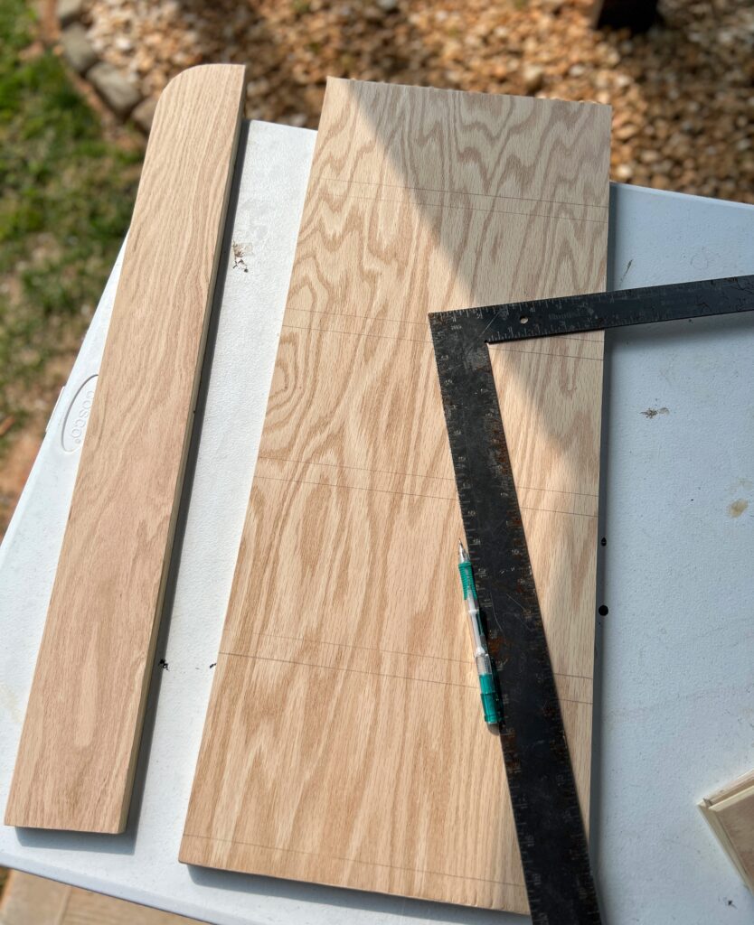 Marking lines with a framing square for spice rack shelves