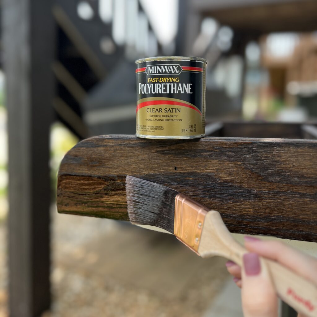 applying minwax fast-drying polyurethane in clear satin to a wood spice rack