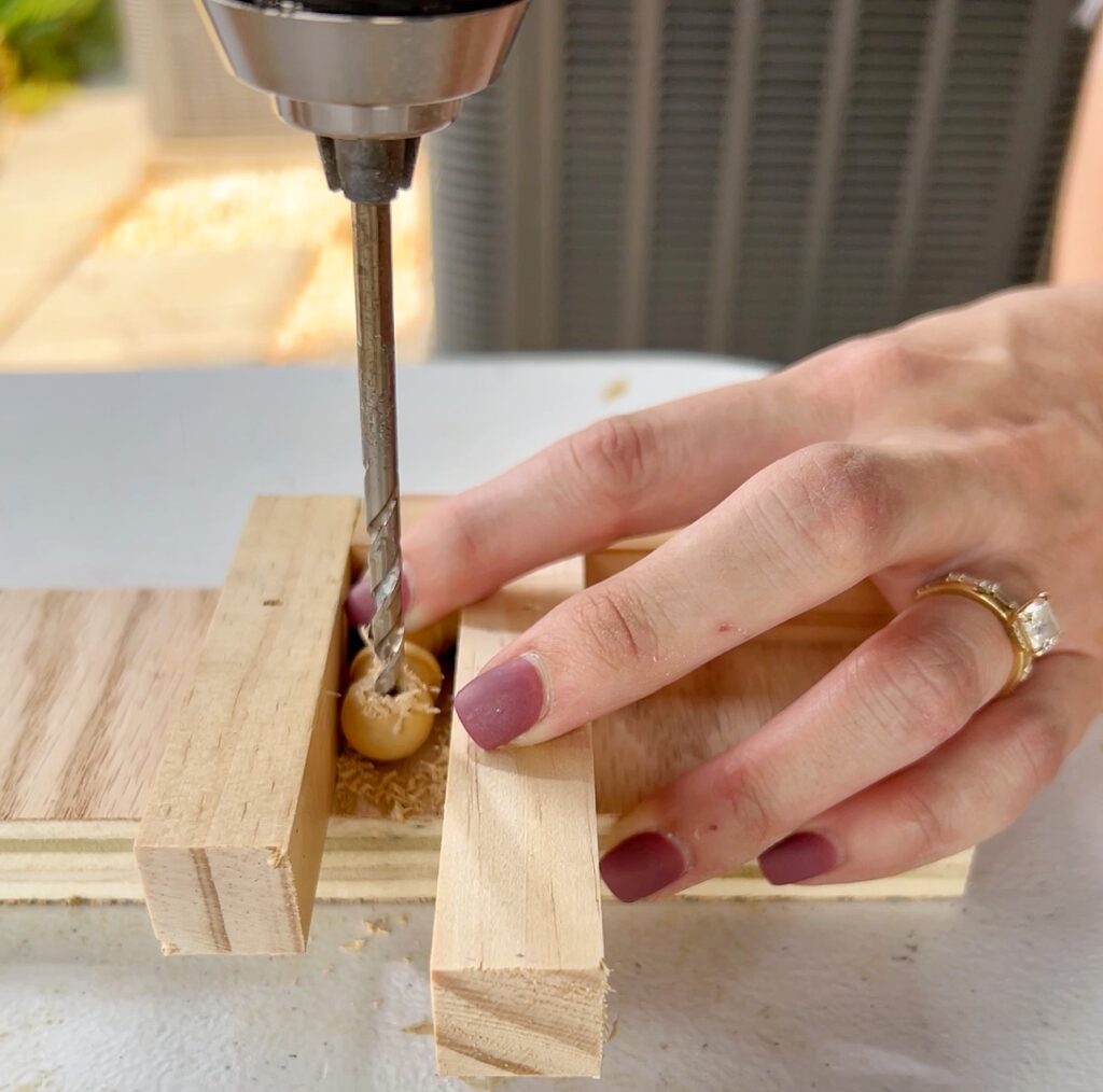 drilling a hole in wooden chess pawn for DIY brass rails