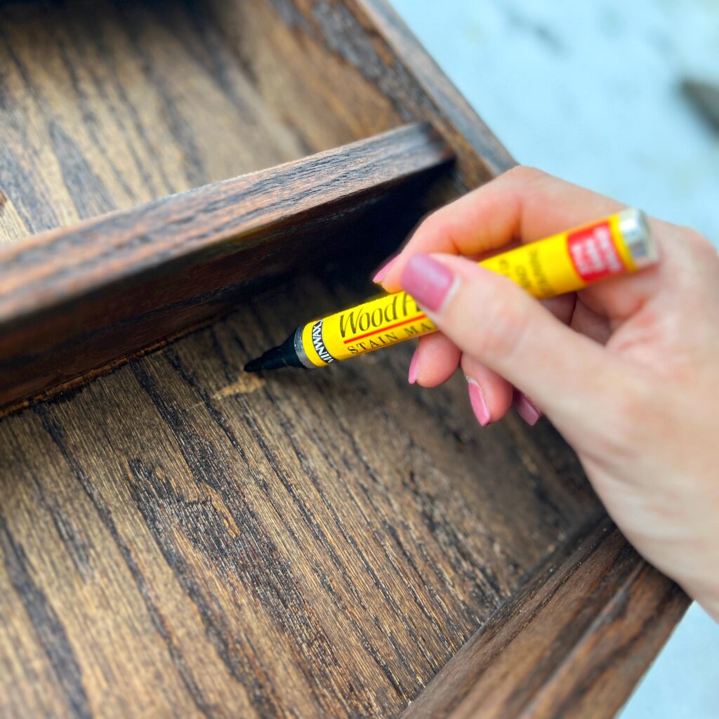 using minwax dark walnut stain marker on the areas that didn't hold onto the stain due to wood glue