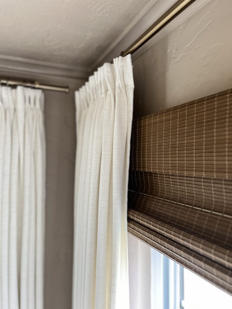 layered window treatments in a sunroom