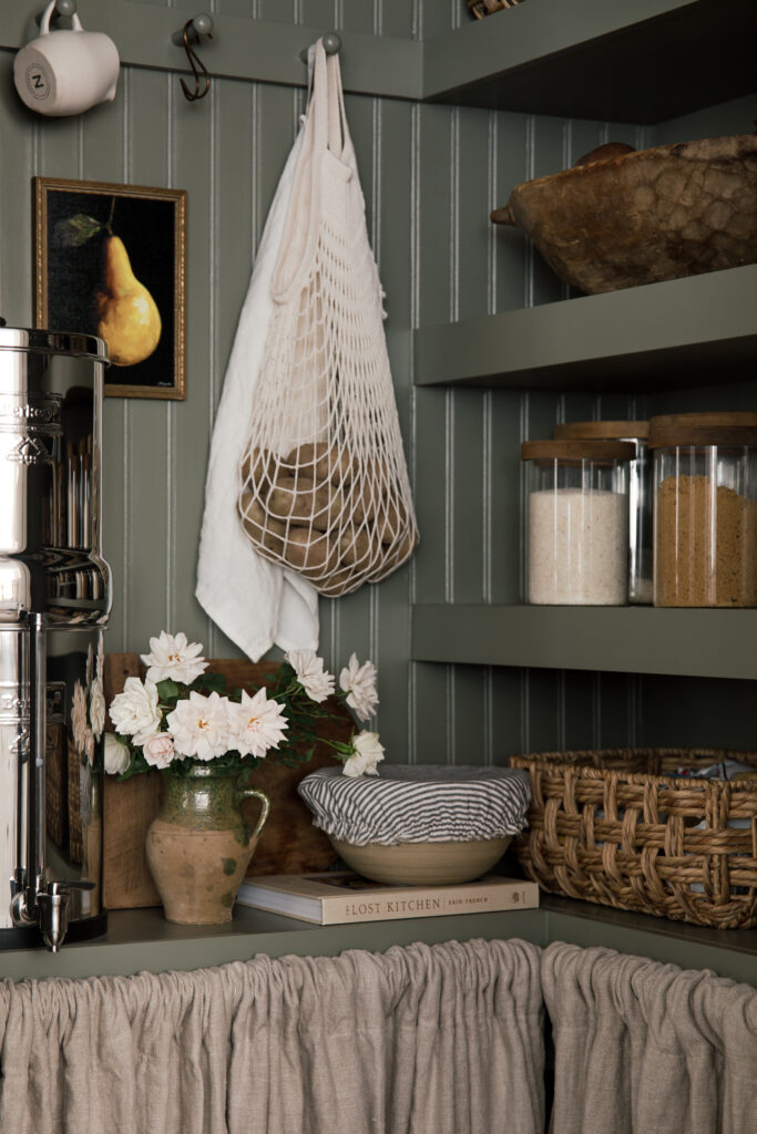 green pantry with beadboard