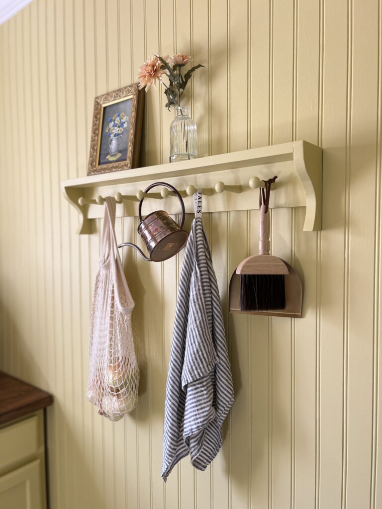 Shaker peg rail shelf in a pantry