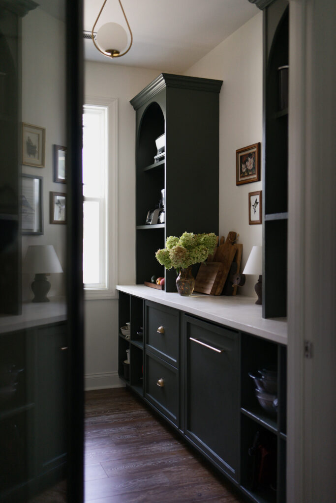 moody DIY pantry with arched built ins