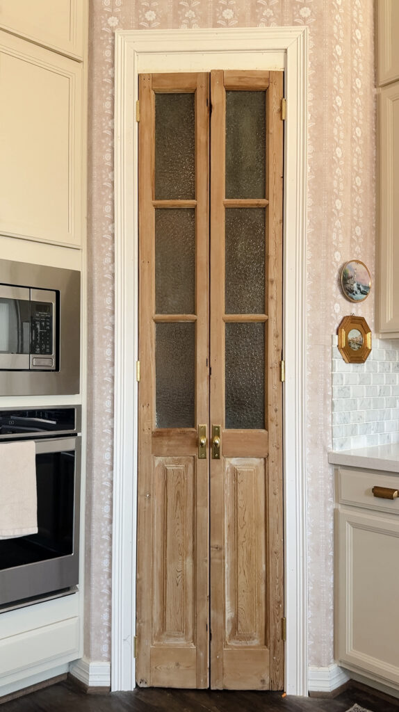 walk in pantry with antique doors