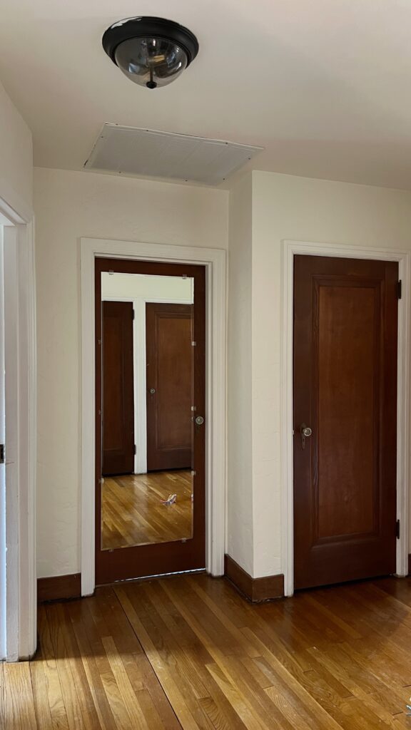 hallway with ceiling air return vent
