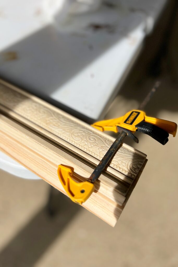 diy wood trim for medicine cabinet framing
