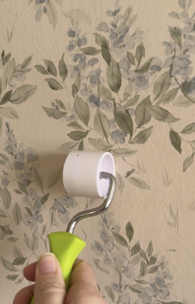 using a wallpaper seam roller