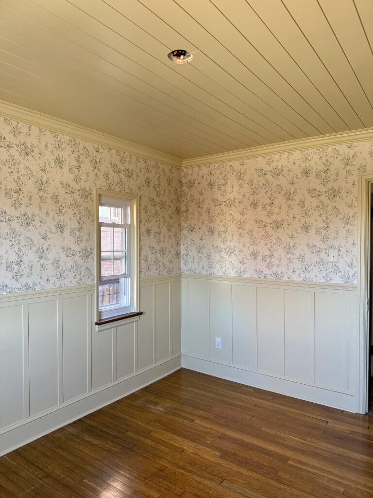 yellow nursery with wallpaper